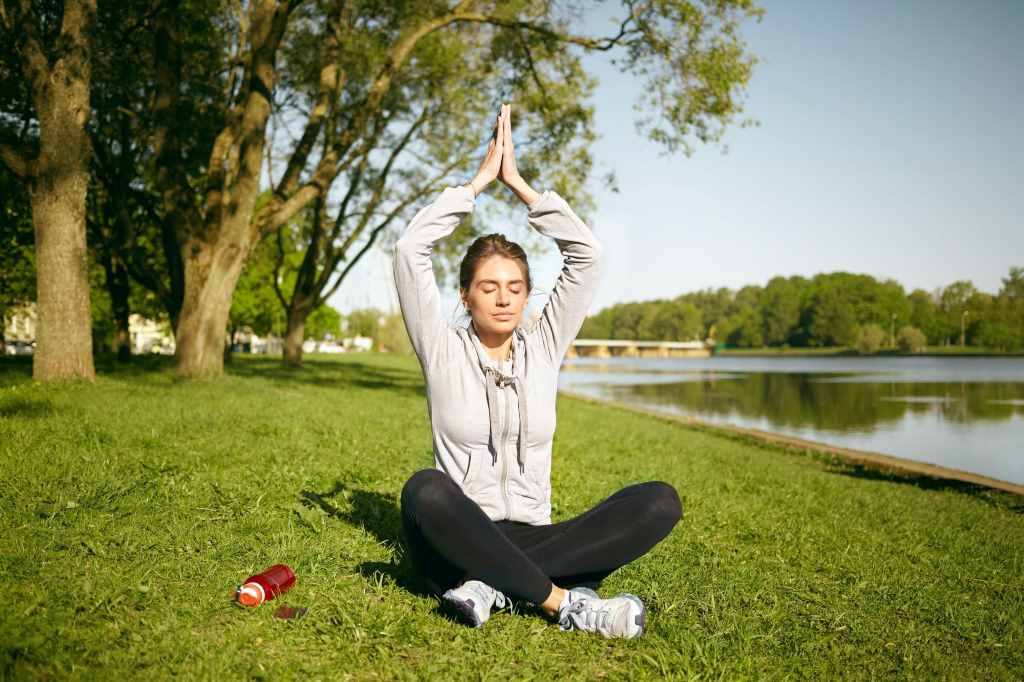 Woman practicing yoga outdoor
